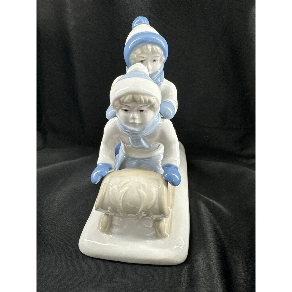 Sled Ride Paul Sebastian Porcelain Figurine 6